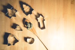 Spatula with dried marijuana and cookie cutters