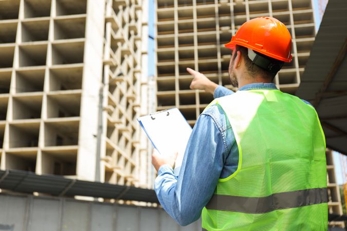 Young man civil engineer in safety hat