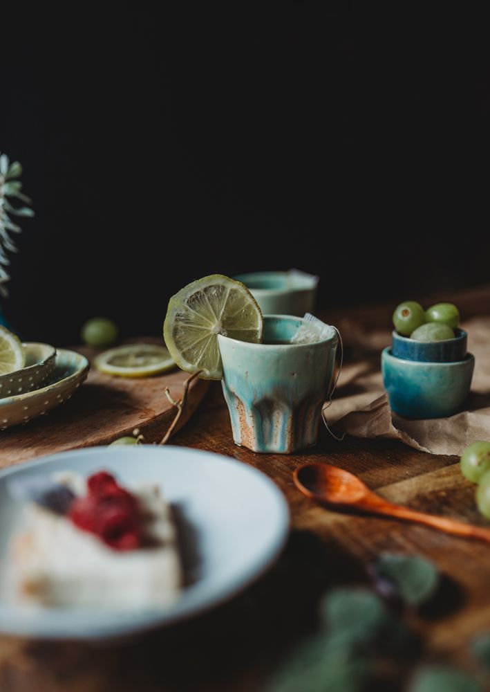 Arrangement of ceramic utensil on wood table