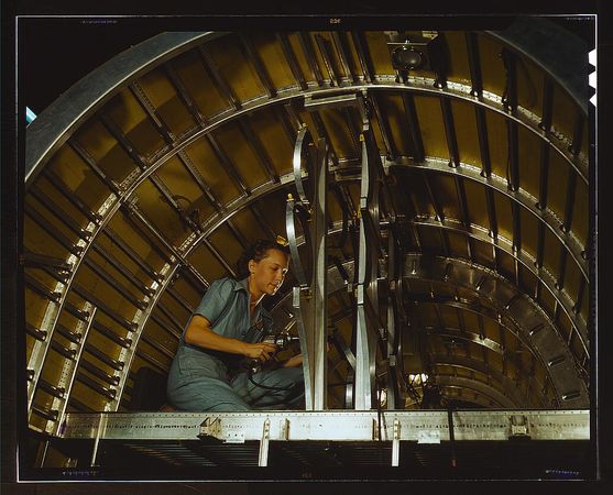 Fort Worth, TX, USA - 1942: Woman working on B-24 bombers