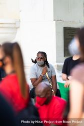 Los Angeles, CA, USA — June 16th, 2020: man with mask and cane listens to speakers at rally 4Ze835