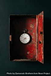 Open box with red interior and clock 5lvqYb