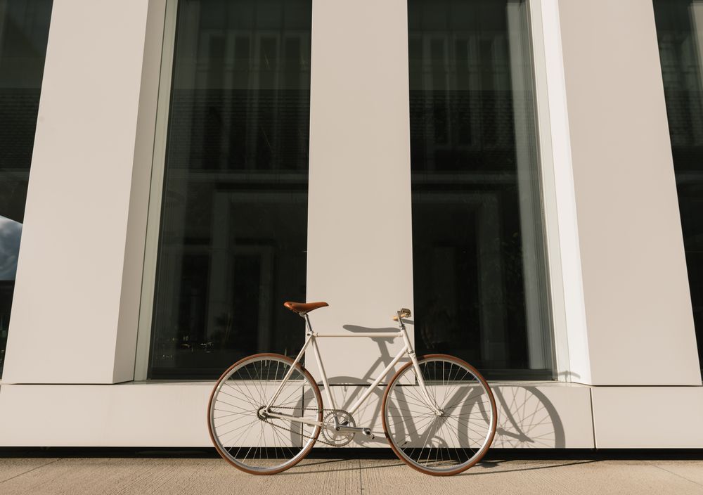Bicycle parked outside modern building