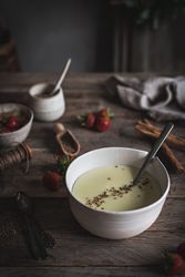 Strawberry porridge in bowl on table