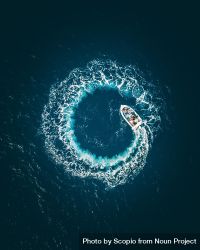 Aerial view of boat making a circular shape with water in sea 4jADx5