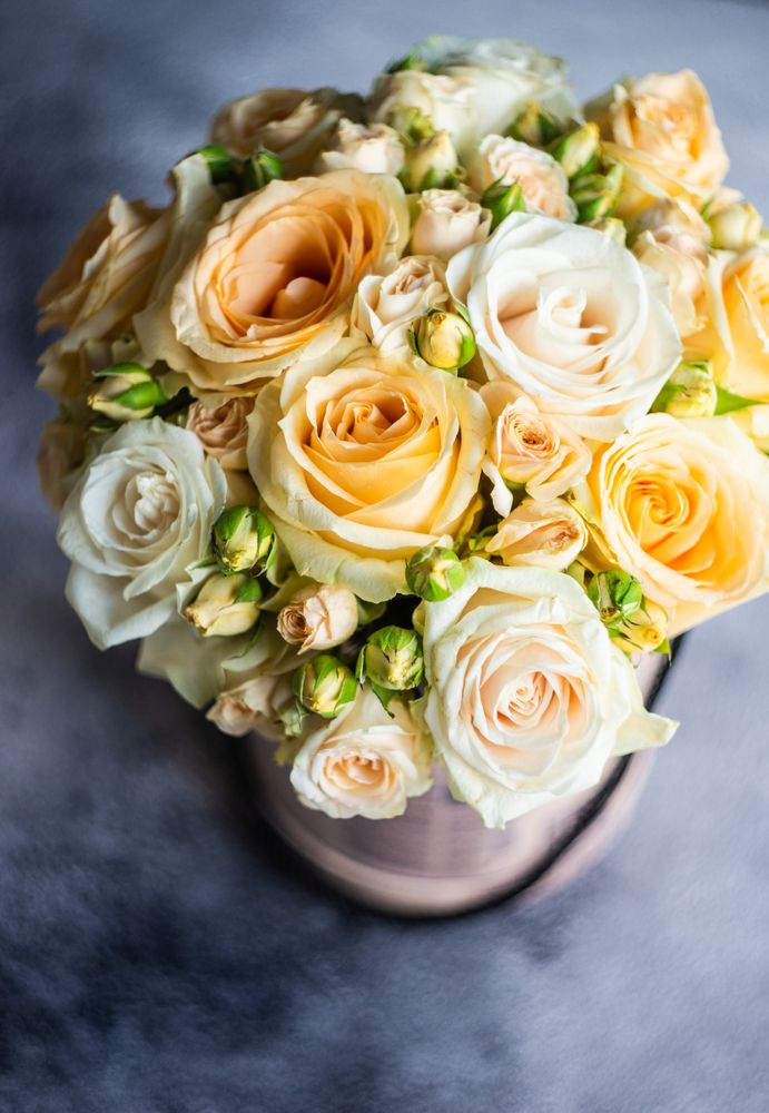 Floral card of yellow roses on concrete counter