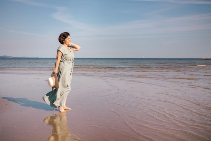 Woman gazing at sea horizon