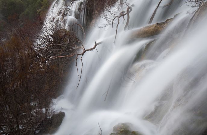 Wonderful waterfall near tree