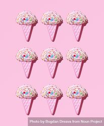 Cute ice cream cone toys on pink background 0KPQ15