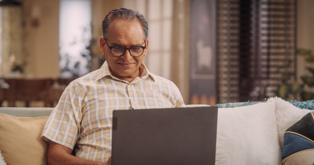 Indian Man Using Laptop