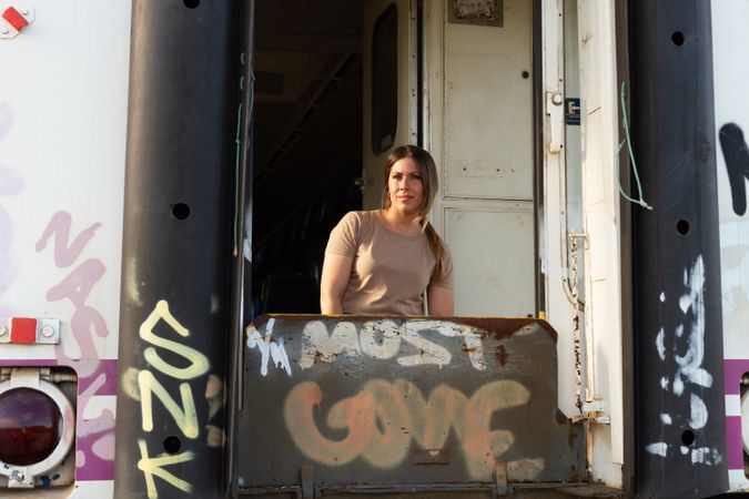 Female soldier in military vehicle