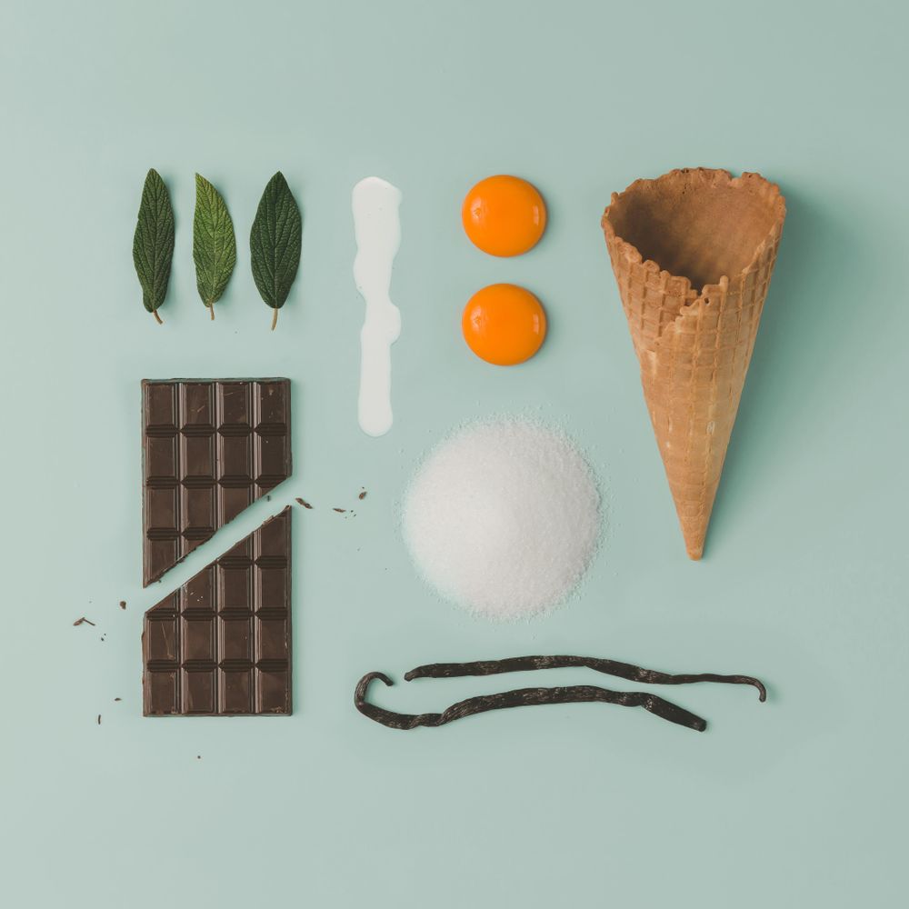 Deconstructed ice cream with egg yokes, mint, chocolate, vanilla beans, sugar, cream and waffle cone