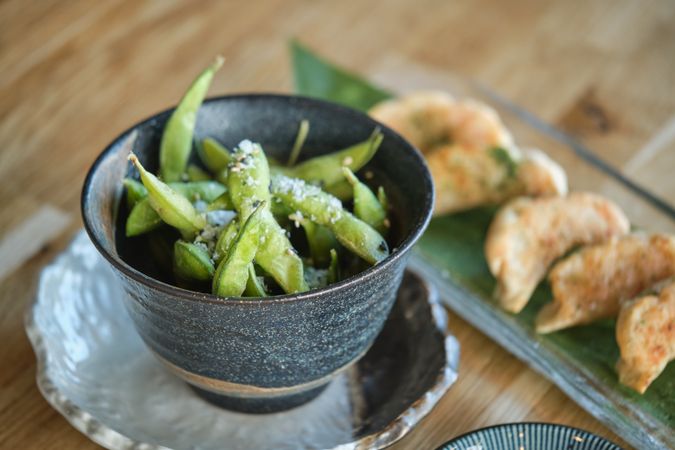 Edamame beans with fried jiaozi