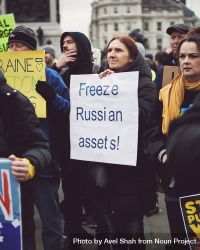 London, England, United Kingdom - March 5 2022: Woman with “Freeze Russian Assets” sign 4N1ZA5