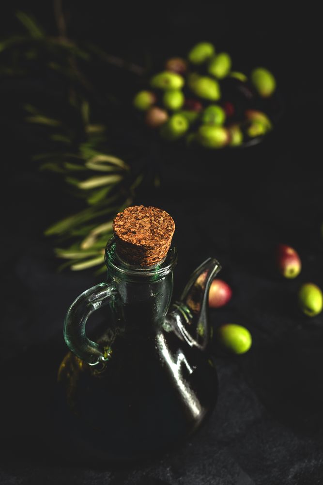 Fresh Spanish extra virgin olive oil with olives