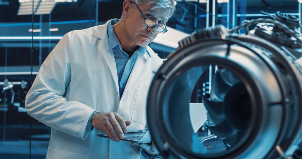 Man Industrial Turbine Specialist Working on an Innovative Invention.