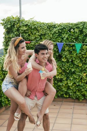 Group of friends having a pool party