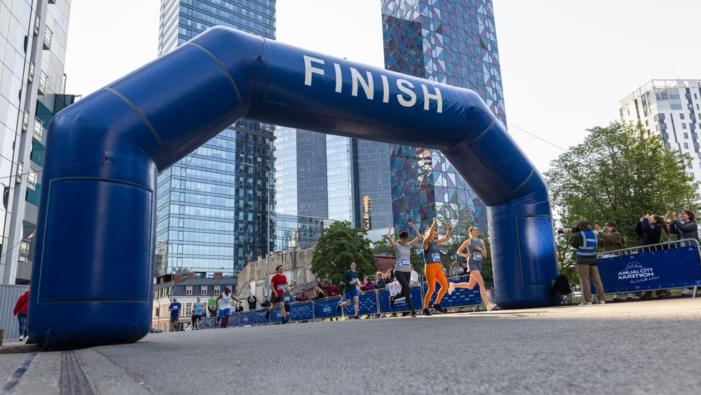 Smiling Group of People Participating in a City Marathon.