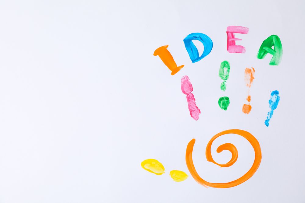 Color child palm and inscription Idea on blank background, space for text