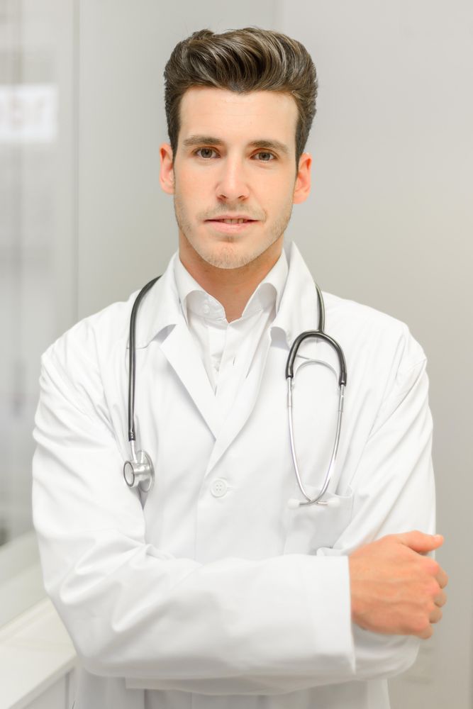 Young male doctor with stethoscope