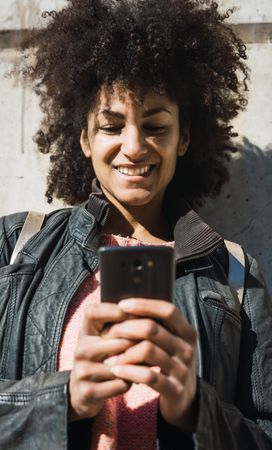 Portrait of Black woman with afro hair