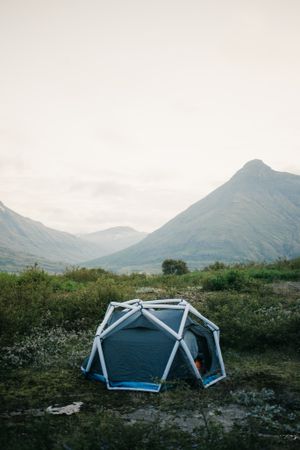 Tent in rocky terrain, vertical