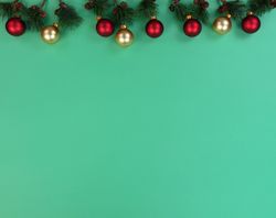 Christmas decorations on green background