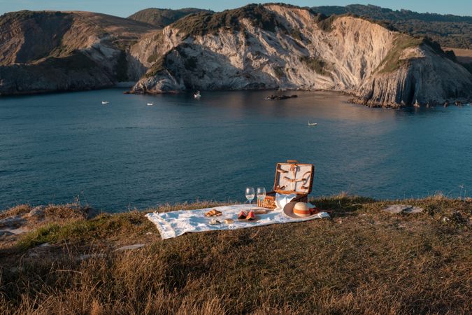 Picnic mat with romantically set near sea and mountains