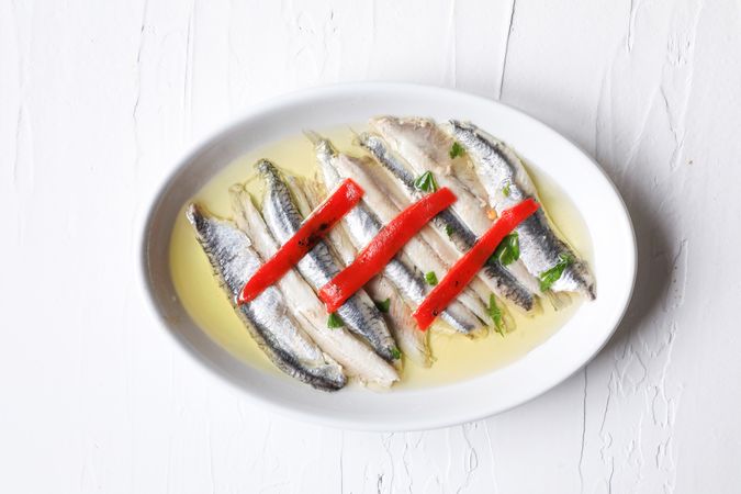 Delicious small sea fish on dish