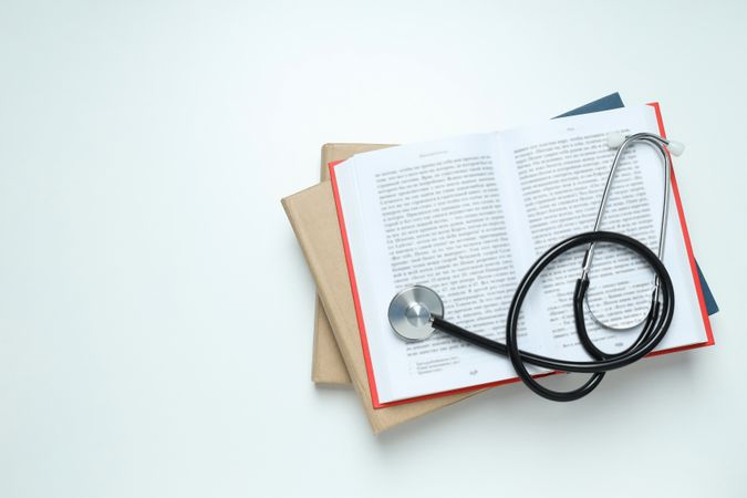 Concept of medical education and books, space for text