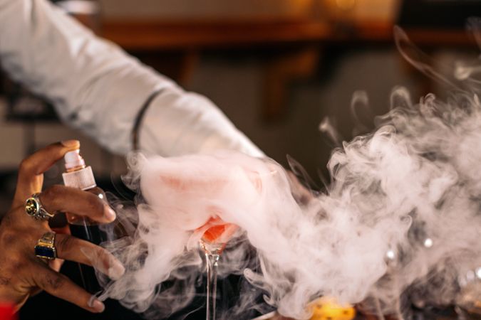 The magic of mix: a bartender preparing his best creations