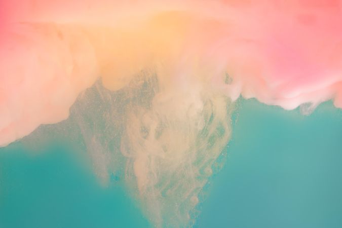 Cloud-like pastel pink color paint with teal background