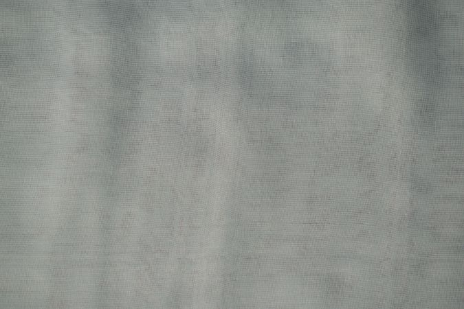 Nude green fabric background texture.