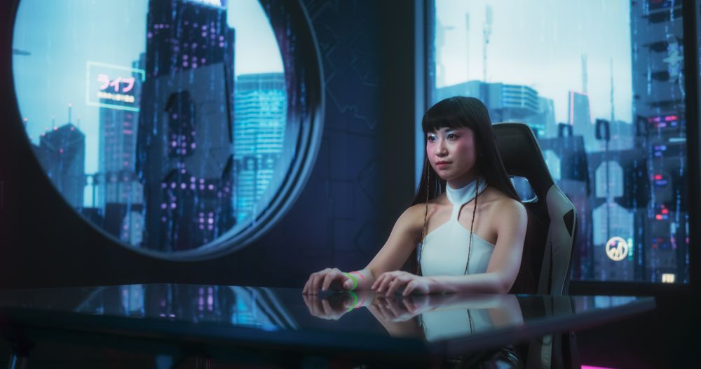 Stylish Japanese Young Woman Interacting with Augmented Reality Platform in a Technologically Advanced Room.