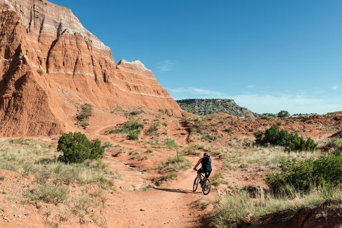 A mountain biker tests a rugged path Palo Duro Canyon State Park, Texas