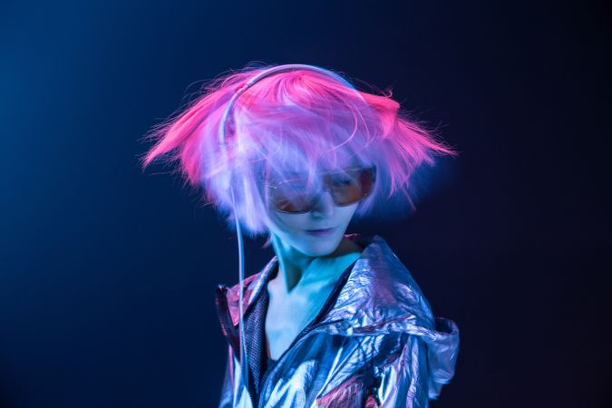Woman dancing while listening to music