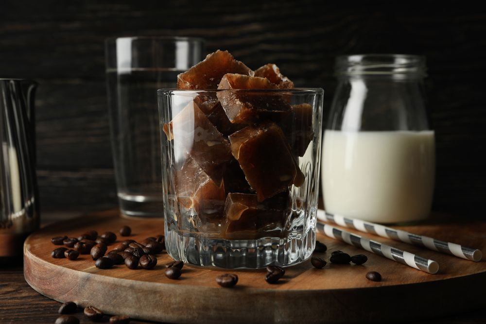 Composition of prepare ice coffee on wooden background