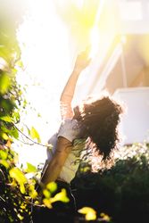 Cheerful woman in garden
