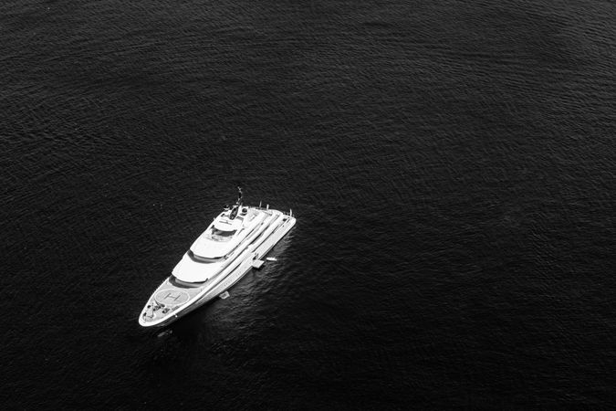 Monochrome shot of a yacht in the sea