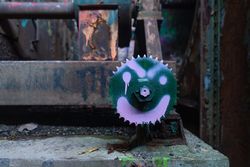 Graffiti of face on gear