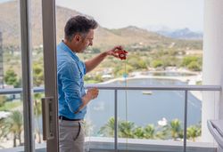 Safety inspector checking balcony railing