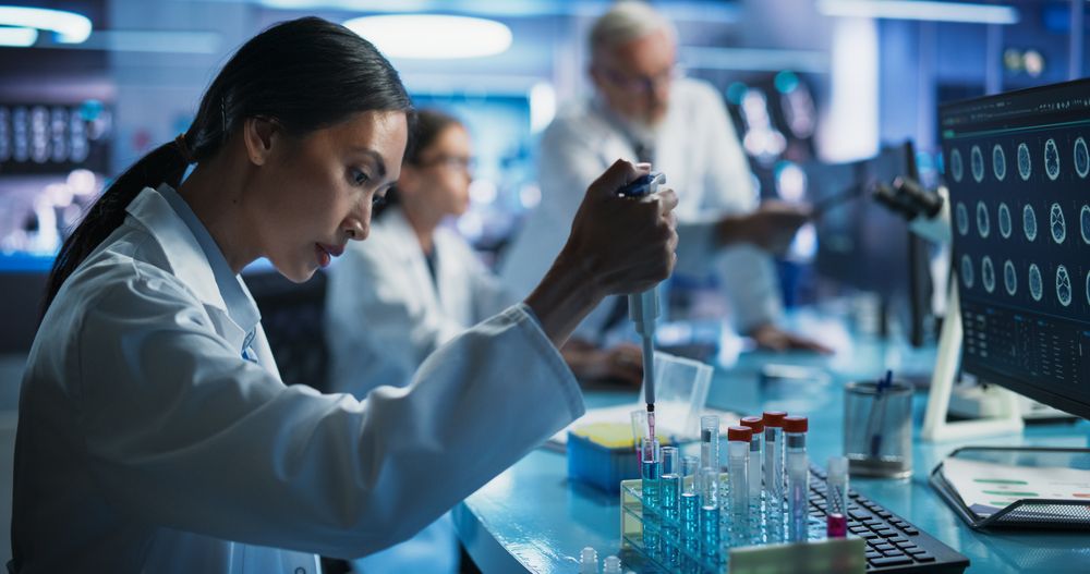 Pharmaceutical Research Laboratory: Female Asian Doctor Working With Test Tubes To Study Innovative Mental Disorder Medicine.