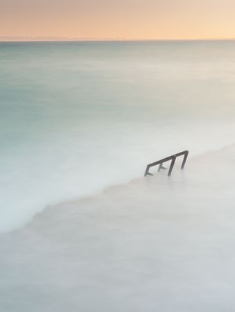Cloudy fog over waving sea