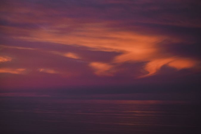 Magnificent orange cloudy sky at dawn