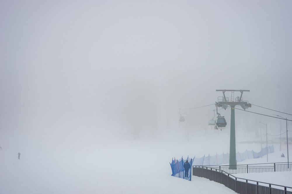 Chairlift for skiers on the Barukiani slope with copy space