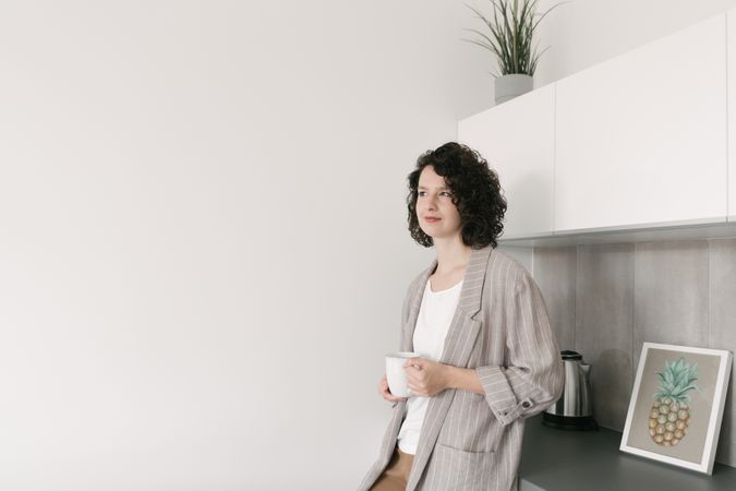 Pensive woman at home