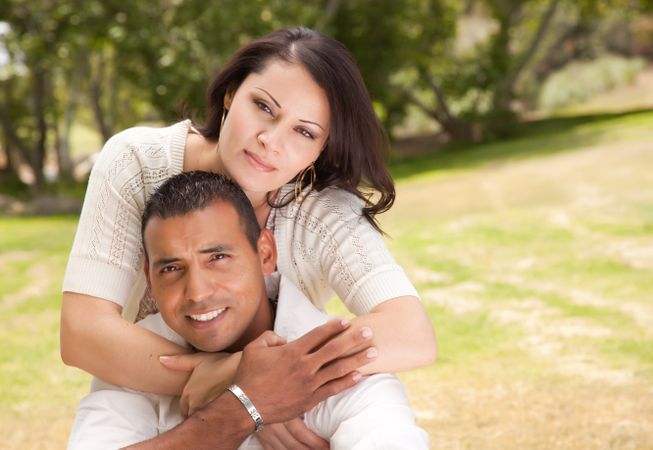 Attractive Hispanic Couple in the Park