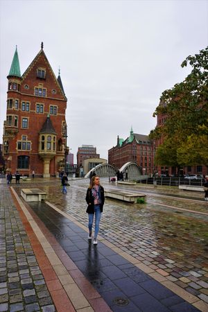 Young woman standing on street in Hamburg, Germany