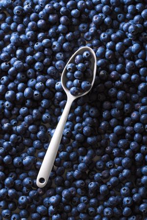 Spoon full of blueberry fruits