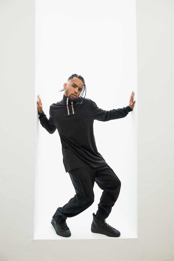Dancing Black male with braids